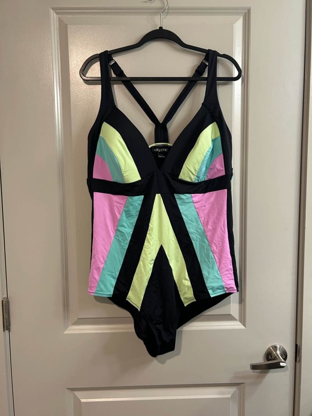 City Chic Black One-Piece Swimsuit with Pastel Pink, Mint, and Yellow Accents